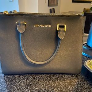 Black Michael Kors tote purse with zippers